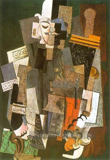 Homme au chapeau melon assis dans un fauteuil 1915 cubisme Pablo Picasso Peintures à l'huile